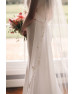 Cathedral-length veil with Ivory lace trim Cathedral-length veil with Ivory lace trim